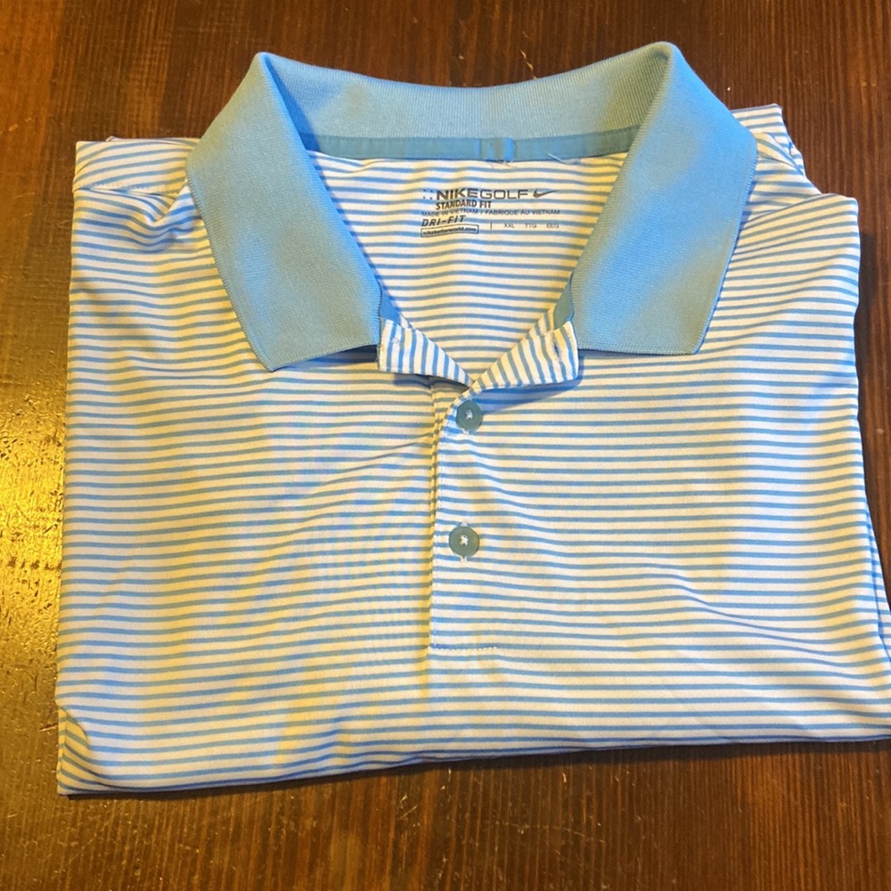 Nike Golf stripes standard fit polo shirt.. brand new.